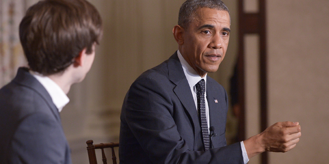 US President Barack Obama speaks during an event on the bloging site Tumblr, in the State Dining Room on June 10, 2014 in Washington, DC. At left is Tumblr Founder and CEO David Karp. AFP PHOTO/Mandel NGAN