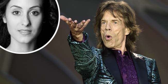 Mick Jagger of the British rock band the Rolling Stones performs during a concert at the Stade de France in Saint-Denis, outside Paris, on June 13, 2014. AFP PHOTO / ERIC FEFERBERG