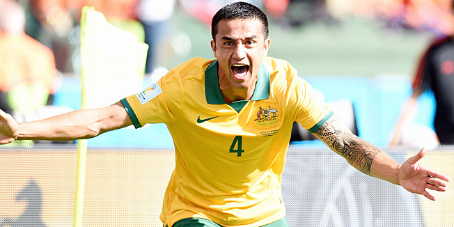 Australia's forward Tim Cahill celebrates after scoring during a Group B football match between Australia and the Netherlands at the Beira-Rio Stadium in Porto Alegre during the 2014 FIFA World Cup on June 18, 2014.     AFP PHOTO / JUAN BARRETO