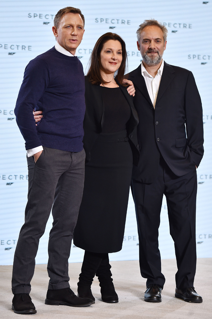 British actor Daniel Craig (L) British director Sam Mendes (R) and US film producer Barbara Broccoli (C) pose during an event to launch the 24th James Bond film 'Spectre' at Pinewood Studios at Iver Heath in Buckinghamshire, west of London, on December 4, 2014. French actress Lea Seydoux and Italian star Monica Bellucci will star alongside Britain's Daniel Craig in the new James Bond film 