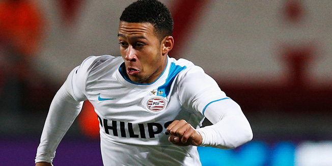 ENSCHEDE, NETHERLANDS - APRIL 04:  Memphis Depay of PSV in action during the Dutch Eredivisie match between FC Twente and PSV Eindhoven held at De Grolsch Veste Stadium on April 4, 2015 in Enschede, Netherlands.  (Photo by Dean Mouhtaropoulos/Getty Images)