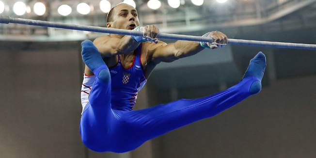 NANNING, CHINA - OCTOBER 12:  Marijo Moznik of Croatia performs on the horizontal bar during the Men's Horizontal Bar Final on day six of the 45th Artistic Gymnastics World Championships at Guangxi Sports Center Stadium on October 12, 2014 in Nanning, China.  (Photo by Lintao Zhang/Getty Images)