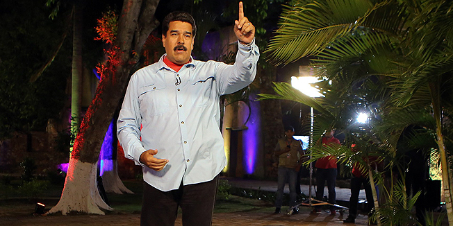 Venezuelan President Nicolas Maduro speaks during a televised program in Anzoategui state on April 21, 2015.  Maduro accused Spanish Prime Minister Mariano Rajoy, who said he belonged to 