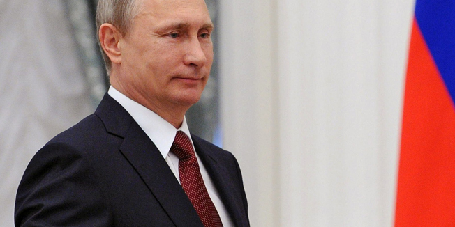 Russian President Vladimir Putin attends the Hero of Labour awards ceremony at the Kremlin in Moscow on May Day on May 1, 2015. AFP PHOTO / POOL / MIKHAIL KLIMENTYEV