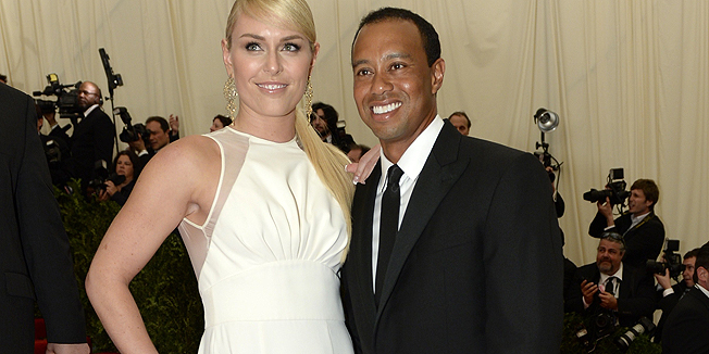 (FILES) In this May 6, 2013 file photo, World Cup skier Lindsey Vonn (L) and golfer Tiger Woods arrive at the Metropolitan Museum of Art's Costume Institute Gala benefit in honor of the museums latest exhibit, Punk: Chaos to Couture  in New York.  Former world number one Tiger Woods and his skiing star girlfriend of three years Lindsey Vonn have separated, it was confirmed May 3, 2015. Vonn announced the split in a statement on her Facebook page, saying the couple had parted due to incompatible schedules. Woods issued a similar statement on his website.  AFP PHOTO/Timothy A. CLARY / FILES