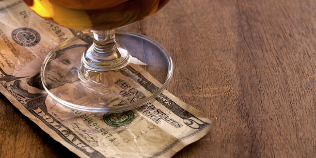 Tip Money on the wooden counter