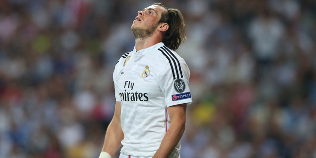 MADRID, SPAIN - MAY 13:  A dejected Gareth Bale of Real Madrid reacts following his team's exit from the competition during the UEFA Champions League Semi Final, second leg match between Real Madrid and Juventus at Estadio Santiago Bernabeu on May 13, 2015 in Madrid, Spain.  (Photo by Alex Livesey/Getty Images)