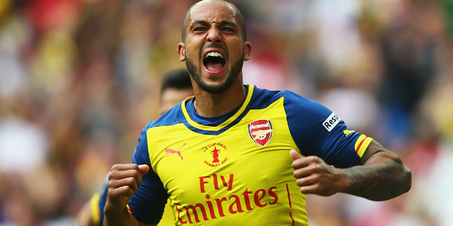 LONDON, ENGLAND - MAY 30:  Theo Walcott of Arsenal celebrates as he scores their first goal during the FA Cup Final between Aston Villa and Arsenal at Wembley Stadium on May 30, 2015 in London, England.  (Photo by Clive Rose/Getty Images)