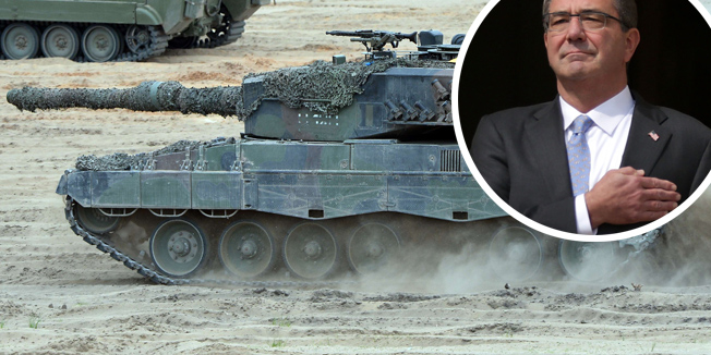 Tanks drive during a NATO Response Force (NRF) troops exercise in Zagan, southwest Poland on June 18, 2015.  AFP PHOTO / JANEK SKARZYNSKI