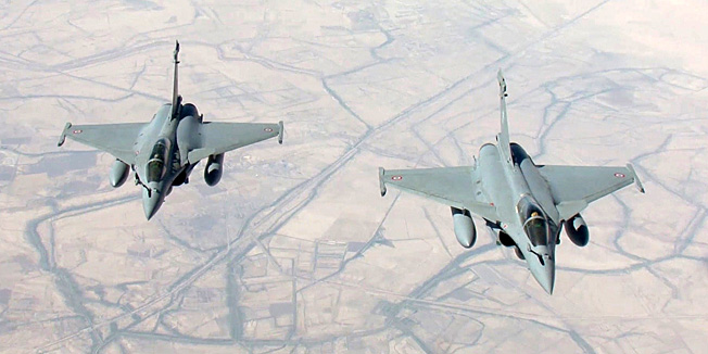 TOPSHOTSA handout picture taken by EMA and released on September 15, 2014 by ECPAD shows two Rafale fighter jets flying on a reconnaissance mission over Iraq after taking off from the Al-Dhafra base in the United Arab Emirates. The world's top diplomats pledged on September 15 to support Iraq in its fight against Islamic State militants by 