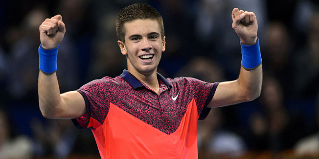 Borna Coric of Croatia reacts after winning his match against Rafael Nadal of Spain at the Swiss Indoors ATP 500 tennis tournament in Basel on October 24, 2014. AFP PHOTO / FABRICE COFFRINI