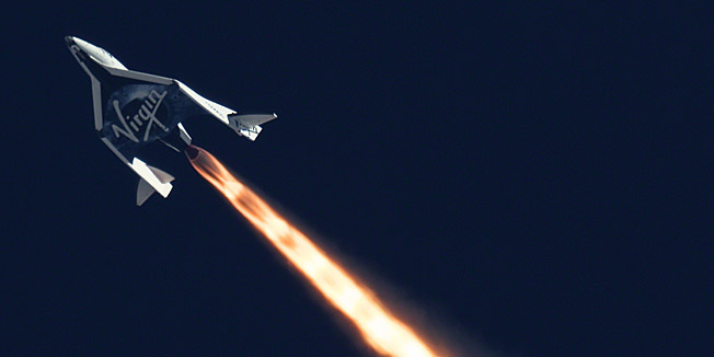 This handout file image obtained October 31, 2014, courtesy of NASA and  Mars Scientific/Clay Center Observatory shows SpaceShipTwo as it completed its second powered flight on  September 5,2013 over the Mojave desert.  Virgin Galactic's SpaceShipTwo craft suffered an 