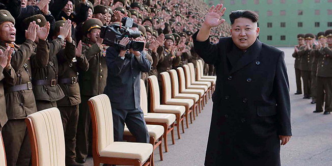 This picture taken by North Korea's official Korean Central News Agency (KCNA) on November 4, 2014 shows North Korean leader Kim Jong-Un (C) reacting to participants of the third meeting of battalion commanders and political instructors of Korean People's Army (KPA) at the Pyongyang gymnasium.   AFP PHOTO / KCNA via KNS    REPUBLIC OF KOREA OUT    THIS PICTURE WAS MADE AVAILABLE BY A THIRD PARTY. AFP CAN NOT INDEPENDENTLY VERIFY THE AUTHENTICITY, LOCATION, DATE AND CONTENT OF THIS IMAGE. THIS PHOTO IS DISTRIBUTED EXACTLY AS RECEIVED BY AFP     ---EDITORS NOTE--- RESTRICTED TO EDITORIAL USE - MANDATORY CREDIT 