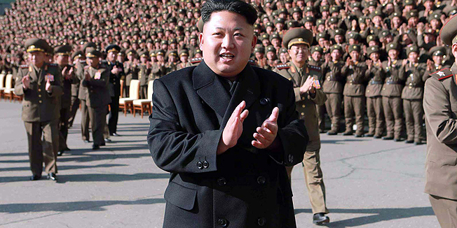 This picture taken by North Korea's official Korean Central News Agency (KCNA) on November 4, 2014 shows North Korean leader Kim Jong-Un (C) reacting to participants of the third meeting of battalion commanders and political instructors of Korean People's Army (KPA) at the Pyongyang gymnasium.   AFP PHOTO / KCNA via KNS    REPUBLIC OF KOREA OUT    THIS PICTURE WAS MADE AVAILABLE BY A THIRD PARTY. AFP CAN NOT INDEPENDENTLY VERIFY THE AUTHENTICITY, LOCATION, DATE AND CONTENT OF THIS IMAGE. THIS PHOTO IS DISTRIBUTED EXACTLY AS RECEIVED BY AFP     ---EDITORS NOTE--- RESTRICTED TO EDITORIAL USE - MANDATORY CREDIT 