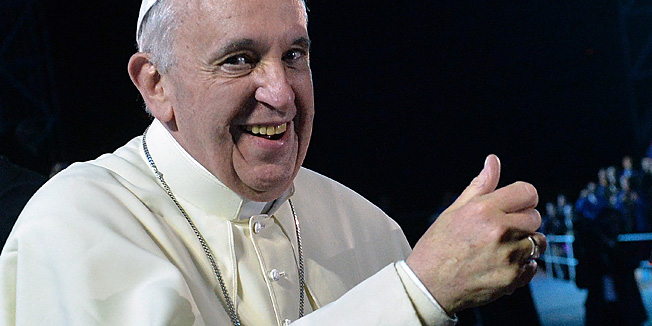Pope Francis gestures upon arrival for a prayer vigil with hundreds of thousands of young Catholic pilgrims attending World Youth Day (WYD), at Copacabana beach in Rio de Janeiro on July 27, 2013, during his week-long visit to Brazil.AFP PHOTO / LUCA ZENNARO-POOL