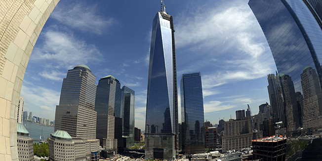 (FILES)The final section of the spire sits on top of One World Trade Center in this May 10, 2013 file photo in New York after it was fully installed on the building's roof.  One World Trade Center will be the nation's tallest building when it is completed next year, a Chicago-based tall buildings council announced on November 12, 2013. Reflecting intense public interest in the decision, the announcement was made before a bank of television cameras in a packed room of the 16th floor of the IIT Tower at the corner of State Street and 35th Street. AFP PHOTO / TIMOTHY A. CLARY