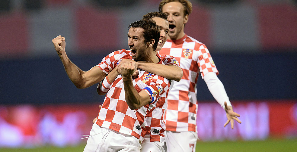 Zagreb, 191113.Stadion Maksimir.Druga, odlucujuca, dokvalifikacijska utakmica za svjetsko prvenstvo u Brazilu izmedju Hrvatske i Islanda.Na fotografiji: slavlje, Darijo Srna, Ivan Perisic, Ivan Rakitic.Foto: Goran Mehkek  / CROPIX