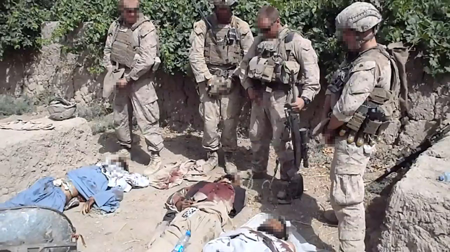 GRAPHIC CONTENTThis image taken from a youtube.com video, blurred to obscure graphic content and identities, allegedly shows four servicemen, dressed in US military uniform, relieving themselves onto three bloodied bodies on the ground, apparently aware that they are being filmed.  The Pentagon has not yet verified the video, which appeared on the Internet  January 11, 2012, but spokesman John Kirby told AFP:  