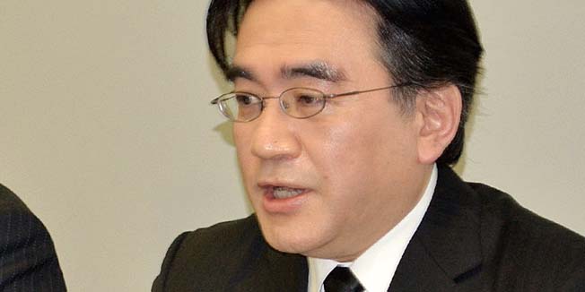 Nintendo President Satoru Iwata speaks during a press conference in Osaka on January 17, 2014. Nintendo on January 17 warned it would swing back into the red this fiscal year as the Japanese gaming giant slashed its sales target for the Wii U console, blaming poor sales over the key holiday season.  JAPAN OUT      AFP PHOTO / JIJI PRESS