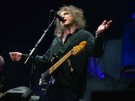 CHICAGO, IL - AUGUST 04: Robert Smith of The Cure performs during Lollapalooza 2013 at Grant Park on August 4, 2013 in Chicago, Illinois.   Theo Wargo/Getty Images/AFP