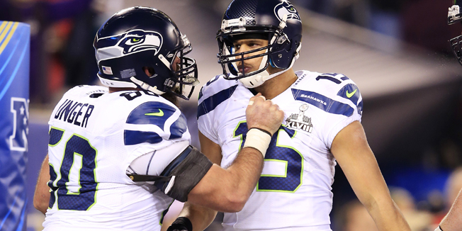 EAST RUTHERFORD, NJ - FEBRUARY 02: Center Max Unger #60 of the Seattle Seahawks and teammate wide receiver Jermaine Kearse #15 react during Super Bowl XLVIII against the Denver Broncos at MetLife Stadium on February 2, 2014 in East Rutherford, New Jersey. The Seattle Seahawks won 43-8.   Jamie Squire/Getty Images/AFP== FOR NEWSPAPERS, INTERNET, TELCOS & TELEVISION USE ONLY ==