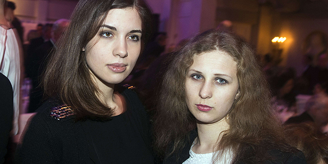 (FILES) This picture taken on February 10, 2014 shows Nadezhda Tolokonnikova (L) and Maria Alyokhina of the Russian punk protest group Pussy Riot arriving for the Cinema for Peace gala in Berlin. The two members of Russian punk group Pussy Riot who were released from prison colonies late last year said they had both been arrested on February 18, 2014 in downtown Sochi during the Olympic Games. 