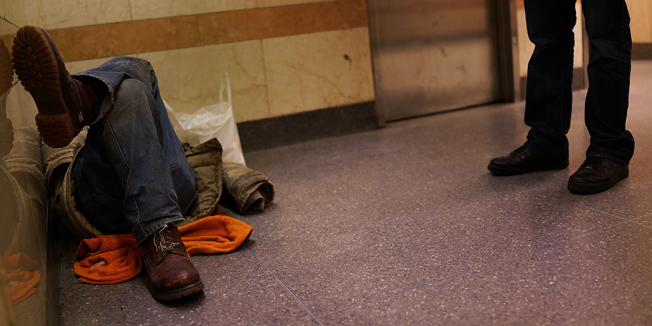 NEW YORK, NY - JANUARY 28: Outreach worker Alvin Thompson (right), speaks with a homeless man in Penn Station on January 28, 2014 in New York City. Over 3,000 volunteers canvased parks, subways, bus stations and other public spaces early Tuesday morning as part of the New York City Department of Homeless Services annual Homeless Outreach Population Estimate (HOPE), where it tries to gain an accurate estimate of the city's homeless population. The study is part of the federally required Point-In-Time survey, which serves as a snapshot of how many are homeless on any given day in a community. The results are used to devise ways to both better understand the nation's homeless population and ways to assist them in getting off of the streets. According to a recent study by the by the United States Department of Housing and Urban Development, New York City's homeless population increased by 13 percent at the beginning of 2013. Despite an improving local economy, as of last January an estimated 64,060 homeless people were in shelters and on the street in New York. Only Los Angeles had a larger percentage increase than New York for large cities.   Spencer Platt/Getty Images/AFP== FOR NEWSPAPERS, INTERNET, TELCOS & TELEVISION USE ONLY ==