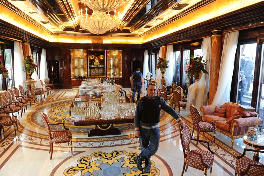 A Maidan (Independence Square) self-defence activist poses as they guard the Mezhyhirya, the private residence of ousted Ukrainian President Viktor Yanukovych, near Kiev on February 24, 2014. Ukraine issued an arrest warrant on February 24 for ousted president Viktor Yanukovych over the 