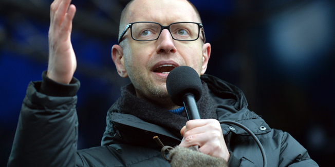 (FILES)-- A file photo taken on February 9, 2014 shows Arseniy Yatsenyuk, one of the leaders of the opposition Batkivshchyna party, gesturing as he speaks during a Ukrainian opposition rally on Independence Square in Kiev. Ukraine's parliament on February 27, 2014 approved the nomination of pro-EU Arseniy Yatsenyuk as the crisis-hit country's new prime minister until presidential polls are held in May. AFP PHOTO/ SERGEI SUPINSKY