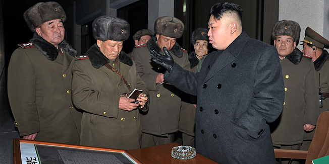 This undated picture, released from North Korea's official Korean Central News Agency on February 22, 2013 shows North Korean leader Kim Jong Un (3rd R) inspecting a firing exercise by a sub-unit under Korean People's Army large combined unit 526 at undisclosed place in North Korea.   AFP PHOTO / KCNA via KNS   ---EDITORS NOTE--- RESTRICTED TO EDITORIAL USE - MANDATORY CREDIT 