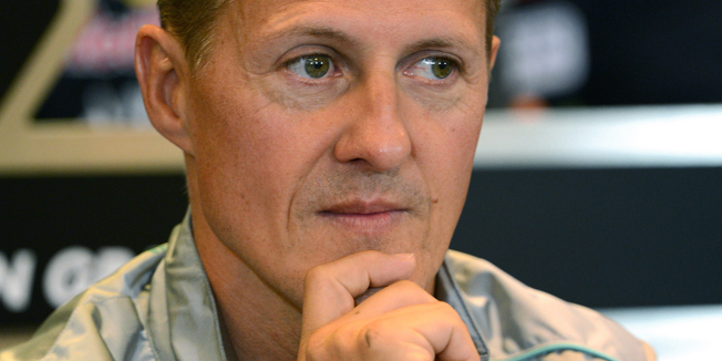 (FILES) A file picture taken on August 30, 2012 shows Mercedes' German driver Michael Schumacher attending a press conference at the Spa-Francorchamps circuit  in Spa ahead of the Belgium Formula One Grand Prix. The hospital in Grenoble dismissed the rumour, spread on a social network, that Michael Schumacher has died, on February 6, 2014. Schumacher has been in intensive care in Grenoble University Hospital since being flown there by helicopter following his December 29 accident in the Alpine resort of Meribel.AFP PHOTO / DIMITAR DILKOFF