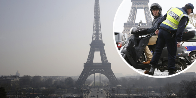 TOPSHOTSA picture taken on March 14, 2014 shows the Eiffel tower in central Paris through a haze of pollution. More than 30 departments in France are hit by maximum level pollution alerts since the day before, prompting Ecology Minister to say air quality was 