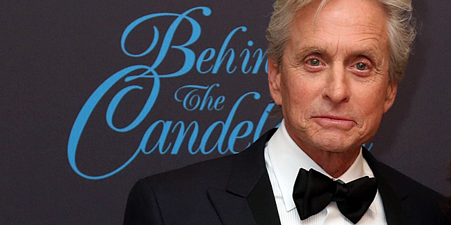 US actor Michael Douglas poses on May 21, 2013 as he attends a party for the film 