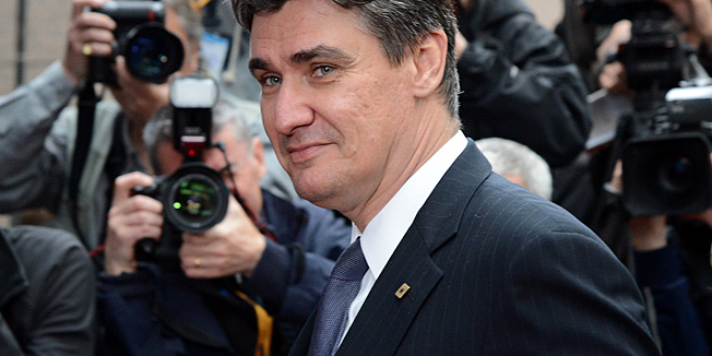 Croatian Prime Minister Zoran Milanovic arrives for the European Council meeting at the EU headquarters in Brussels on June 27, 2013. European Commission President Jose Manuel Barroso announced a political deal on the EU's hotly contested 2014-2020 trillion-euro budget, hours before an EU summit mulls how to get millions of jobless youths back into the workplace.  AFP PHOTO / THIERRY CHARLIER