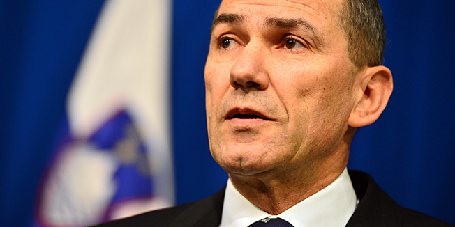 (FILES) A file photo taken on January 24, 2013 shows Slovenian Prime Minister Janez Jansa giving a press conference in Ljubljana a day after a junior partner from Slovenia's ruling coalition quit  the center-right government, a move that strips the alliance of its majority and potentially pushes the country toward a political crisis. Jansa notified on February 1 the eurozone country's parliament he would take over the finance ministry temporarily after Janez Sustersic's resignation last week.  Sustersic and Justice Minister Senko Plicanic resigned following their Civil List (DL) party's decision to quit Jansa's center-right five-party coalition.    AFP PHOTO / JURE MAKOVEC