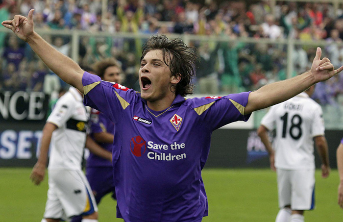 Fiorentina's Adem Ljajic, of Serbia, celebrates after scoring during a Serie A soccer match between Fiorentina and Parma at the Artemio Franchi stadium in Florence, Italy, Sunday, Sept. 26, 2010. (AP Photo/Fabrizio Giovannozzi) 