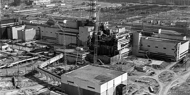  Picture taken from a helicopter in April 1986 shows a general view of the destroyed 4th power block of Chernobyl's nuclear power plant few days after the catastrophe. A reactor at Chernobyl blew up on April 26, 1986 in the worst nuclear accident in history. It burned for some 10 days, sending radiation across a large swathe of Ukraine, Russia and Belarus. A World Health Organisation report released in September put the overall death toll from Chernobyl at 4,000, though the figure is disputed as being too low. According to the Ukraine, 2.4 million of its people, among them 428,000 children, suffer health problems linked to the nuclear disaster.       AFP PHOTO/VLADIMIR REPIK