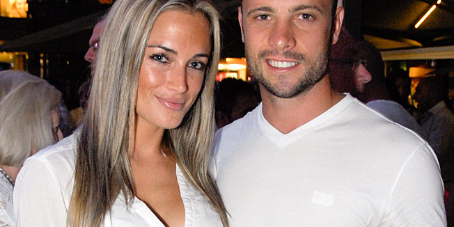 ALTERNATIVE CROPA picture taken on January 26, 2013 shows Olympian sprinter Oscar Pistorius posing next to his girlfriend  Reeva Steenkamp at Melrose Arch in Johannesburg. South Africa's Olympic sprinter Oscar 