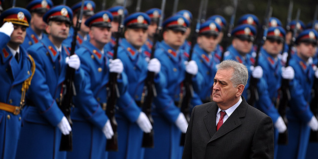 Serbian President Tomislav Nikolic inspects an honour guard at the monument of the Unknown Soldier on mount Avala near Belgrade, on February 15, 2013, on Serbia's Statehood Day, a celebration of the 209th anniversary of the first Serbian uprising and the creation of the modern Serbian state.   AFP PHOTO / ANDREJ ISAKOVIC