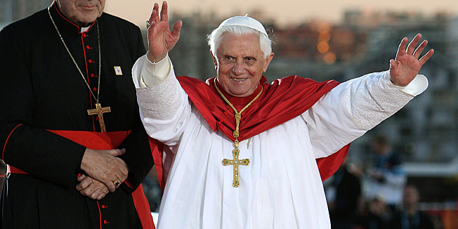 (FILES) This file photo taken on July 17, 2008 shows Pope Benedict XVI (R) gesturing as he leaves with Cardinal George Pell (L) following the official welcome to pilgrims at World Youth Day at Barangaroo in Sydney. Australia's most senior Catholic, Cardinal George Pell, criticised outgoing Pope Benedict XVI on February 23, 2013, describing his historic resignation as destabilising and questioning his governance skills.    AFP PHOTO / FILES / Greg WOOD