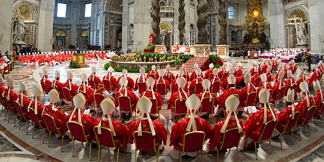 This handout picture released by the Vatican Press Office on March 12, 2013 shows cardinals following a grand mass at the St Peter's basilica before the start of a papal election conclave on March 12, 2013 at the Vatican. Cardinals moved into the Vatican today as the suspense mounted ahead of a secret papal election with no clear frontrunner to steer the Catholic world through troubled waters after Benedict XVI's historic resignation.  AFP PHOTO/OSSERVATORE ROMANO  RESTRICTED TO EDITORIAL USE - MANDATORY CREDIT AFP PHOTO/OSSERVATORE ROMANO