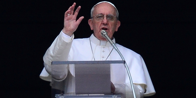 Pope Francis leads his first Angelus prayer from the window of the apartments at St Peter's square on March 17, 2013 at the Vatican.The pope's first Angelus prayer, delivered from a window high above St Peter's Square, is a chance for the first Latin American pontiff to begin to sketch out a more global vision for the role of the Roman Catholic Church.   AFP PHOTO / GIUSEPPE CACACE