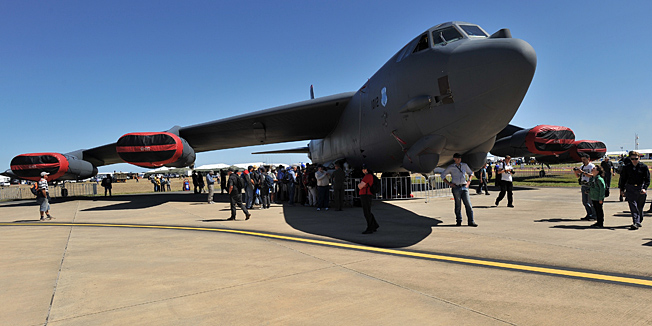 Patrons line up to look through a US Air Force B-52 bomber during the Australian International Airshow in Melbourne on March 1, 2013. 180,000 patrons are expected through the gates over the duration of the event staged at the Avalon Airfield some 80kms south-west of Melbourne.  AFP PHOTO / Paul CROCK