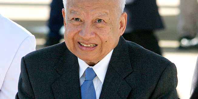 FILE - In this Sept. 2, 2006 file photo, Cambodia's retired King Norodom Sihanouk greets well-wishers before departing for China from Phnom Penh International Airport, in  Cambodia. Sihanouk, the former Cambodian king who was never far from the center of his country's politics through a half-century of war, genocide and upheaval, has died. He was 89.  (AP Photo/Heng Sinith, File)