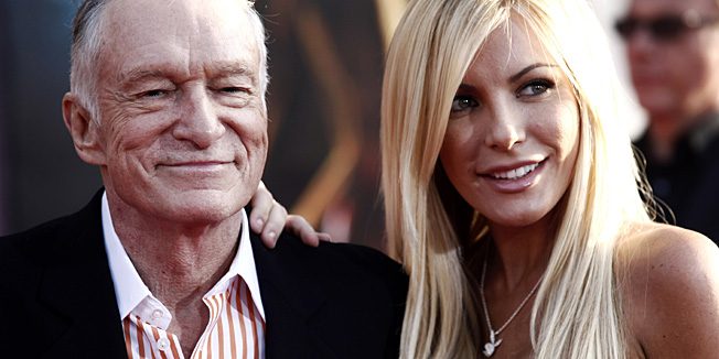 FILE - In this April 26, 2010 file photo, Hugh Hefner, left, and Crystal Harris arrive at the premiere of 