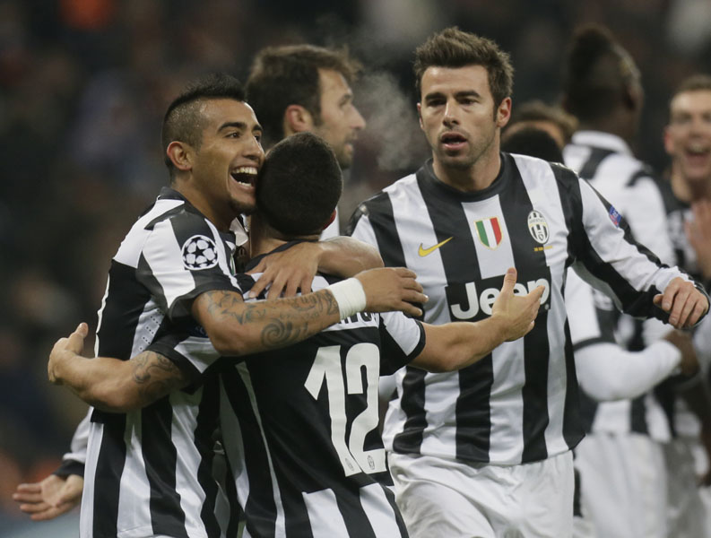 Players of FC Juventus  celebrates after scoring  against Shakhtar Donetsk  during a group E Champions League  soccer match at Donbas Arena  stadium in Donetsk, Ukraine, Wednesday, Dec. 5, 2012.  (AP Photo/Efrem Lukatsky)