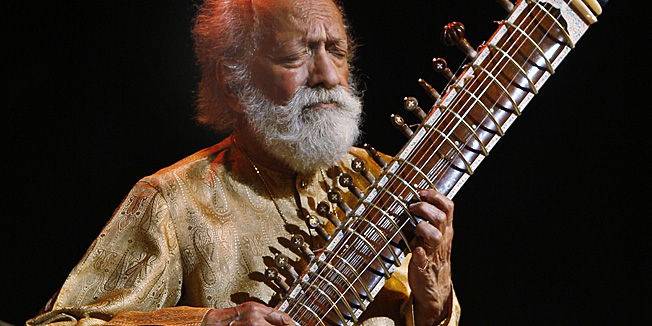 FILE - In this Feb. 7, 2012 file photo, Indian musician Ravi Shankar performs during a concert in Bangalore, India. Shankar, the sitar virtuoso who became a hippie musical icon of the 1960s after hobnobbing with the Beatles and who introduced traditional Indian ragas to Western audiences over an eight-decade career, has died. He was 92.  (AP Photo/Aijaz Rahi, File)