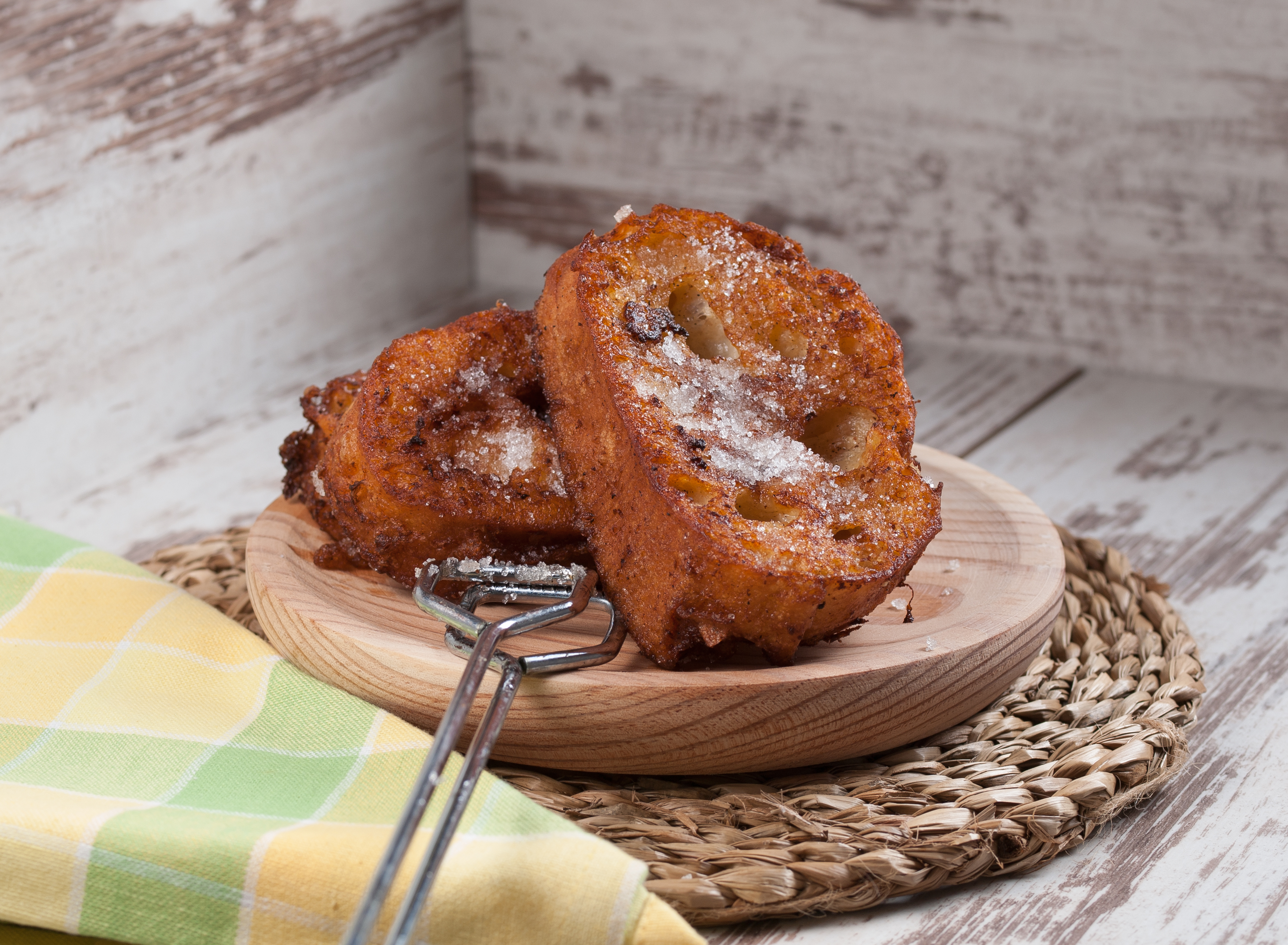 French toasts on a wooden plate. A delicious meal.