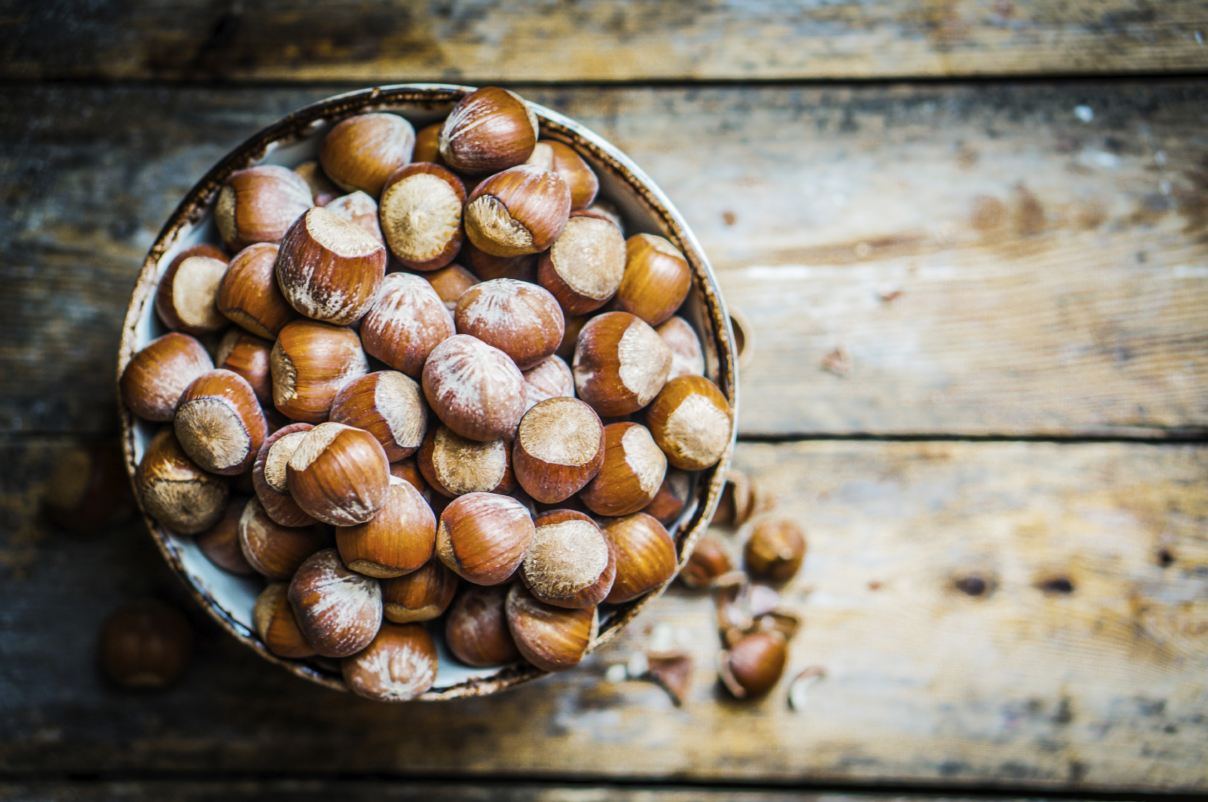 hazelnuts-on-rustic-wooden-background.bin