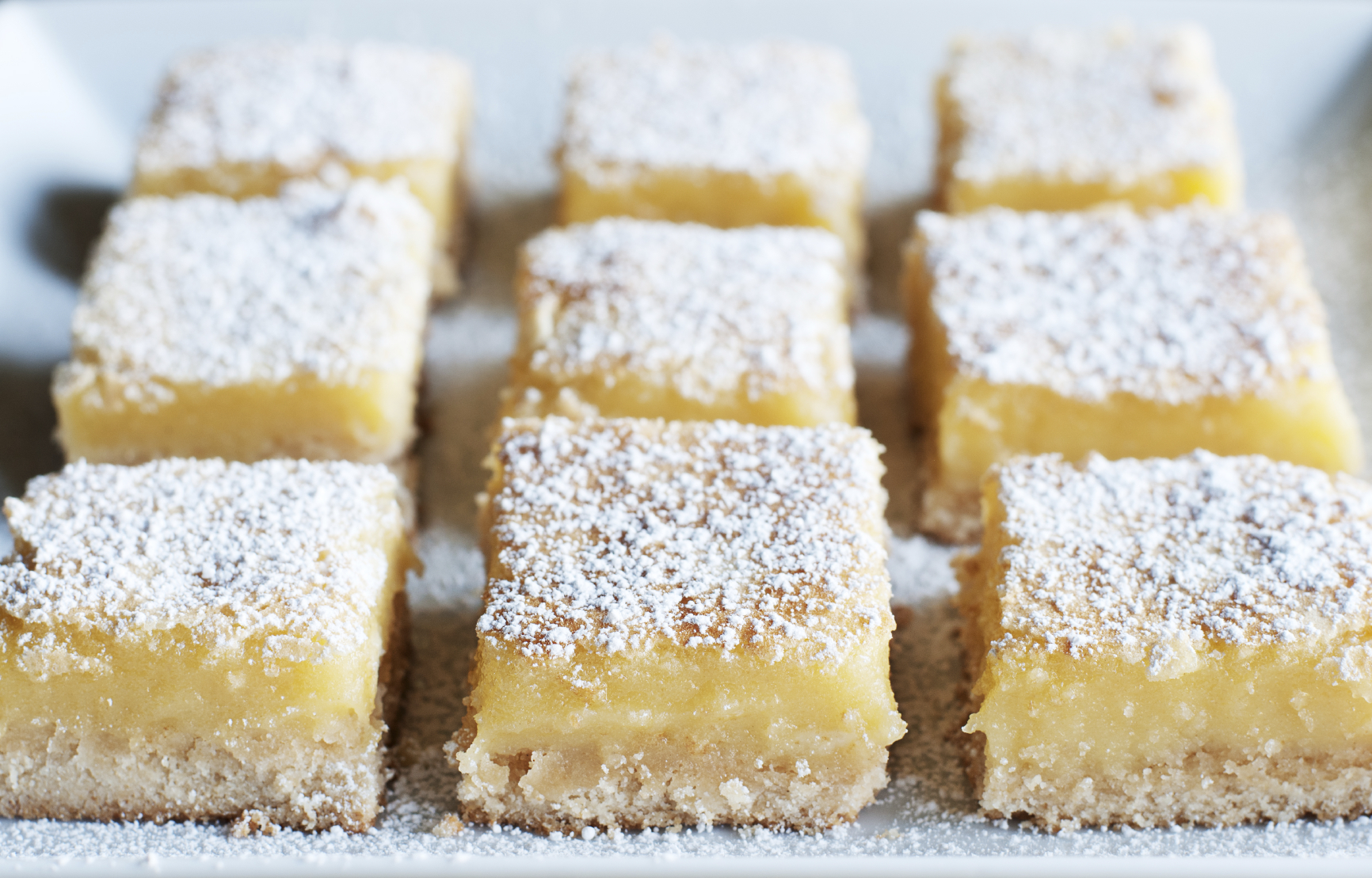 Fresh baked Meyer lemon bars with powdered sugar